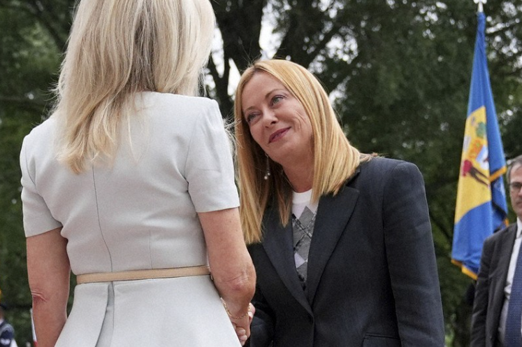 Monica Crowley, White House chief of protocol, left, greets Italy's Prime Minister Giorgia Meloni